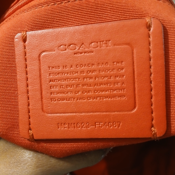 Coach Tyler Tote in an orange/red shade of pebbled leather. - Picture 5 of 16